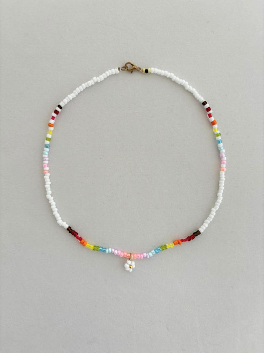 Collier extensible arc-en-ciel et blanc