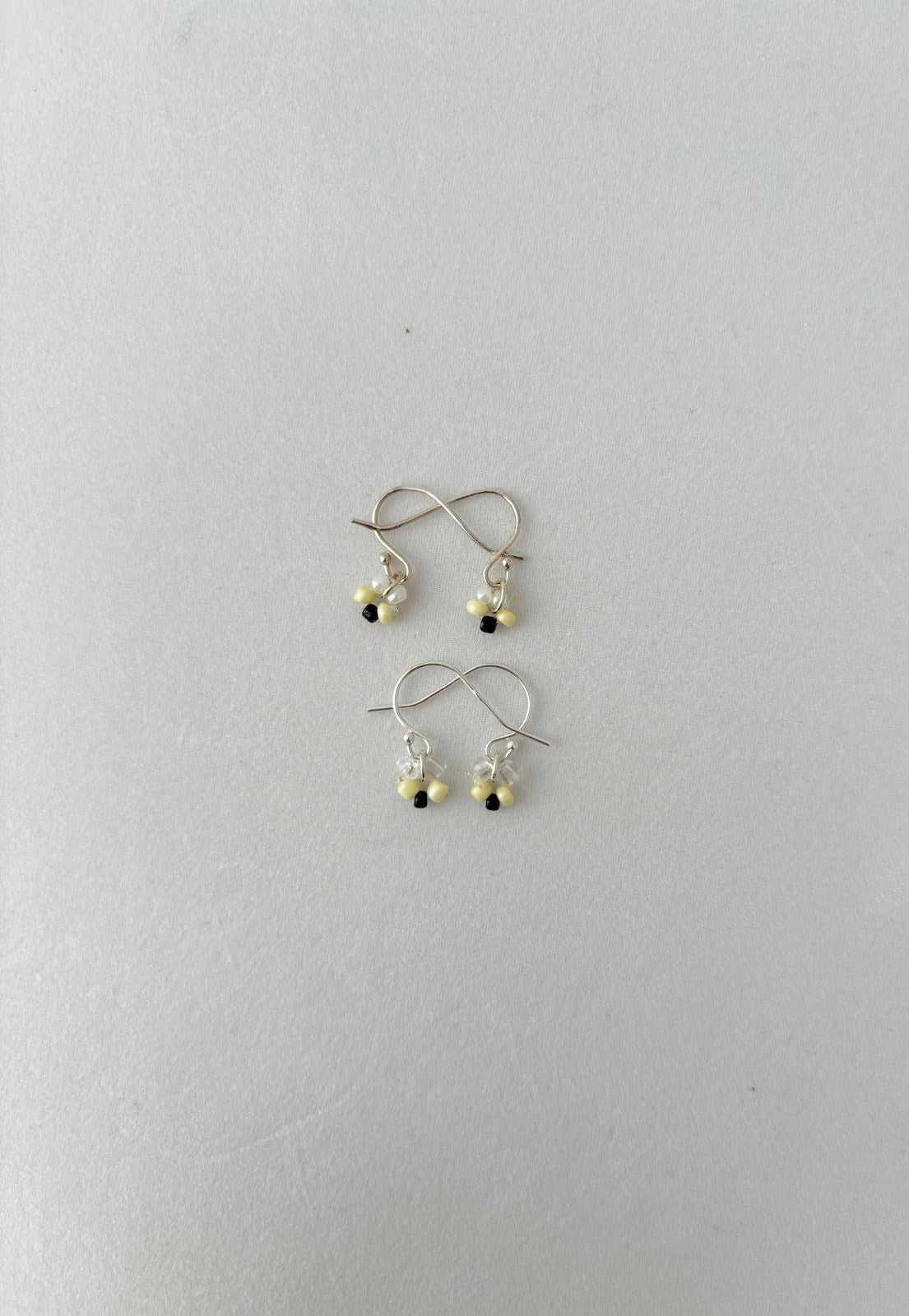 Boucles d'oreilles de la marque Symbolique